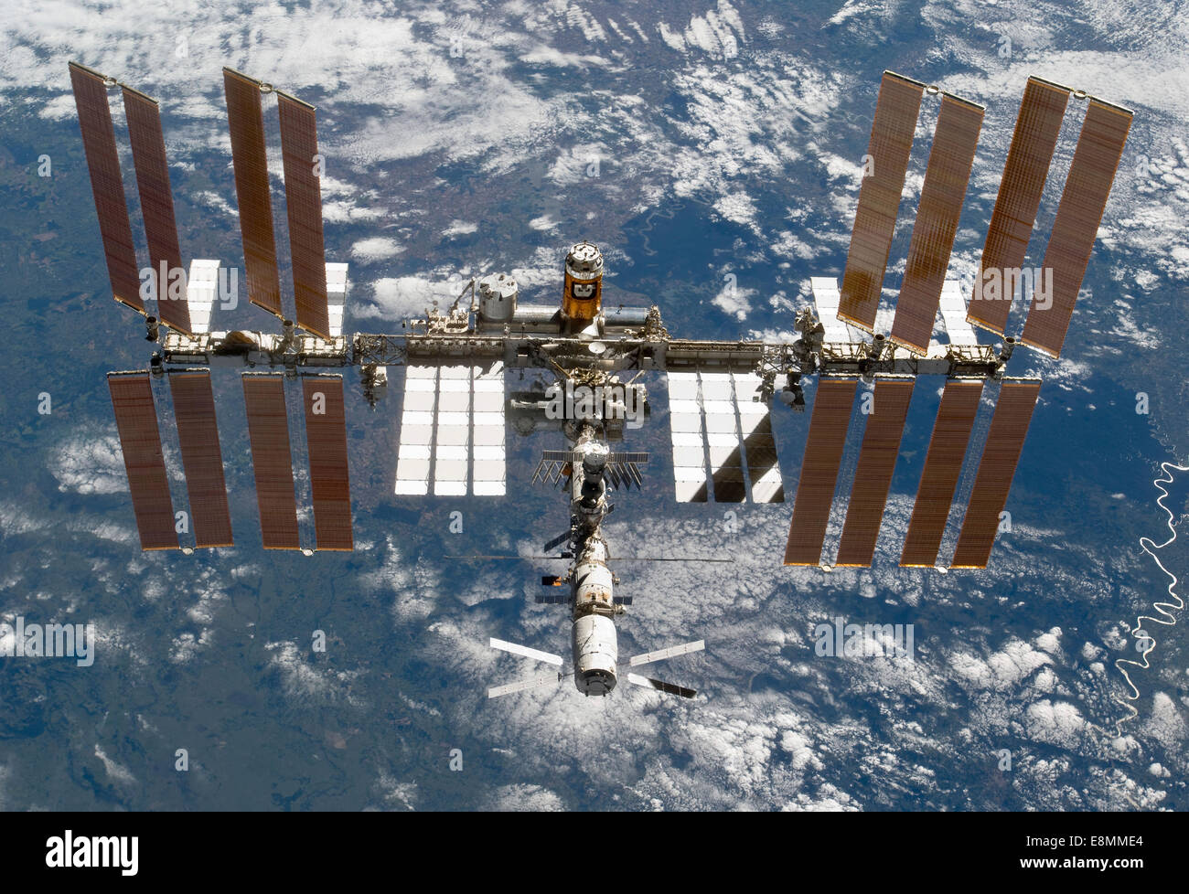 March 7, 2011 - The International Space Station backdropped by a blue and white part of Earth. Stock Photo