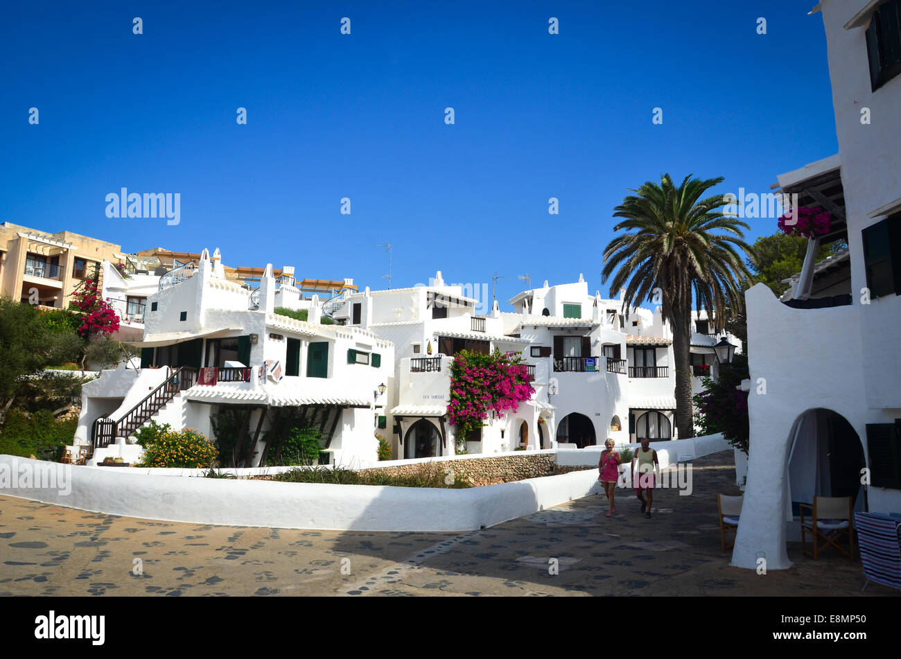 The traditional small white buildings in the town of Binibequer Vell, on the Spanish island of Menorca, in the Mediterranean sea Stock Photo