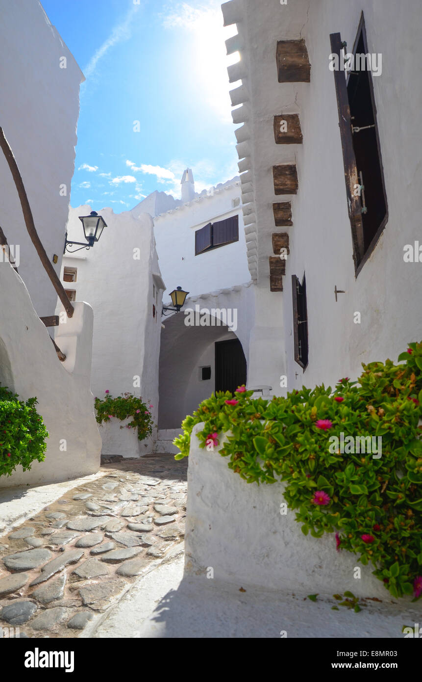 The traditional small white buildings in the town of Binibequer Vell, on the Spanish island of Menorca, in the Mediterranean sea Stock Photo