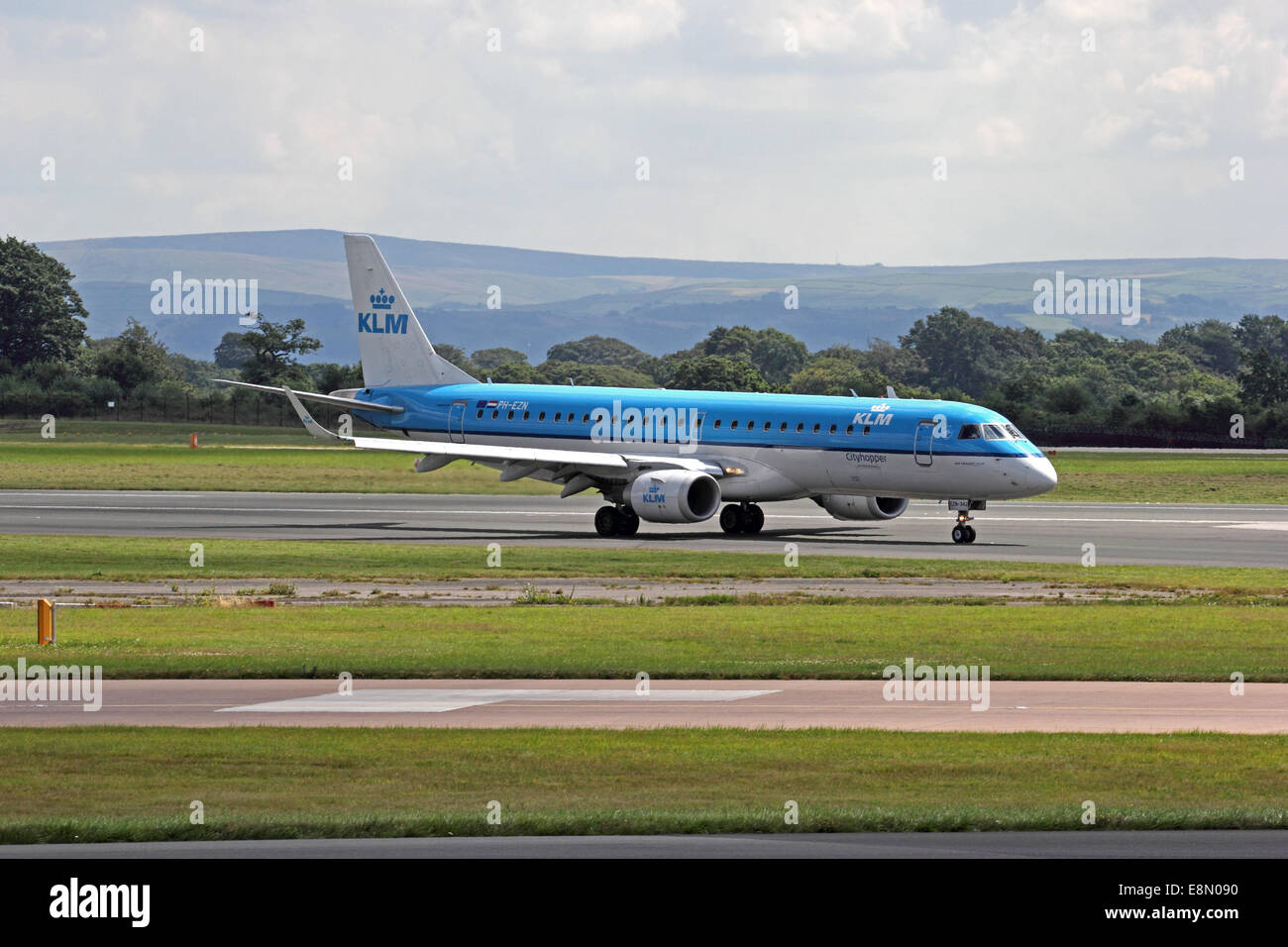 KLM Cityhopper Embraer ERJ-190 aeroplane taxiing at Manchester Airport Stock Photo