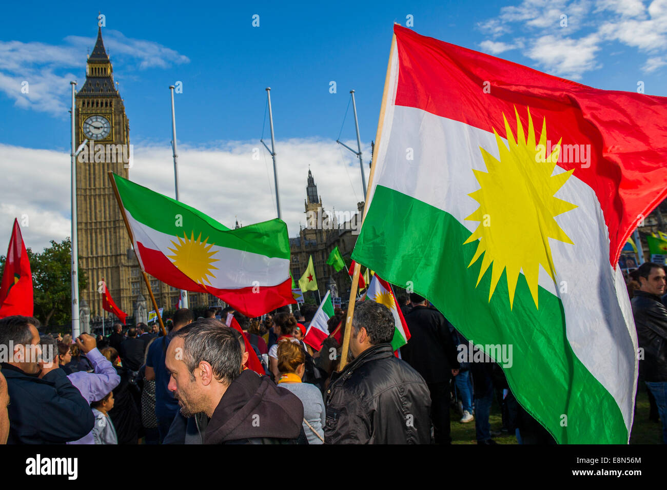 London, UK. 11th Oct, 2014. A protest demanding support for the Kurds and blaming Turkey for not helping is generally peaceful. Although a bungled stop and search kicks off a confrontation that leads to a few arrests. Calm is restored, at least temporarily when Kurdish stewards form a barrier between the protestors and the police lines. Parliament Square, London 11 Oct 2014. Credit:  Guy Bell/Alamy Live News Stock Photo