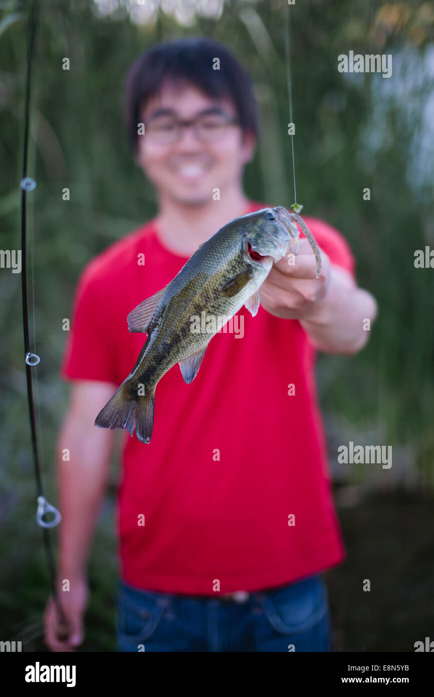 Fishing rod caught fish hi-res stock photography and images - Alamy