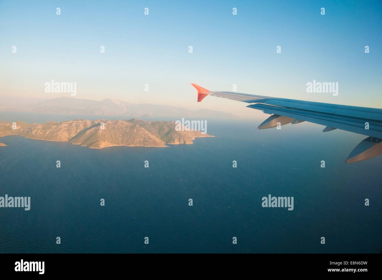 Plane wing fly window sunset hi-res stock photography and images - Alamy