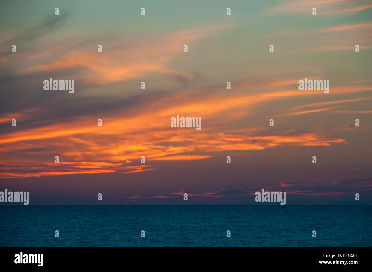 Orange Sunset on the sea horizon, skyline Stock Photo - Alamy