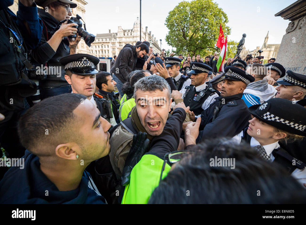 London, UK. 11th Oct, 2014.  Kurdish protesters clash with Met Police 2014 Credit:  Guy Corbishley/Alamy Live News Stock Photo