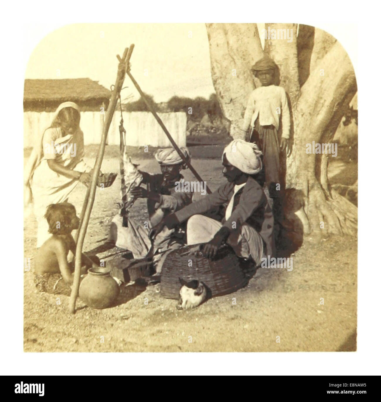 An 1862 illustration from Weld’s account of India, depicting a 'Hindoo Butcher' at work. This image provides insight into traditional Indian occupations and social customs of the period, showcasing a cultural practice of the time. Stock Photo