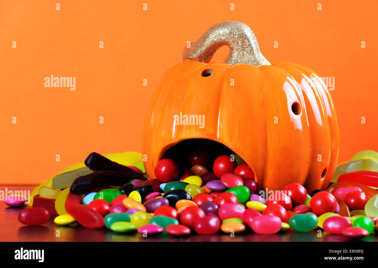 Happy Halloween Jack-o-Lantern pumpkin with colorful trick or treat ...