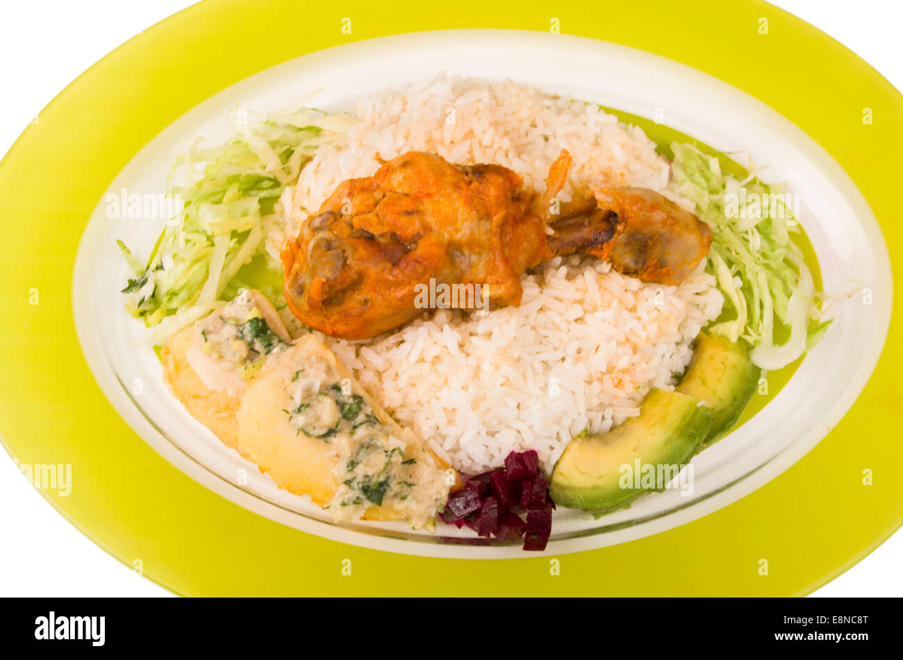 chicken served with white rice potato on a plate Stock Photo - Alamy