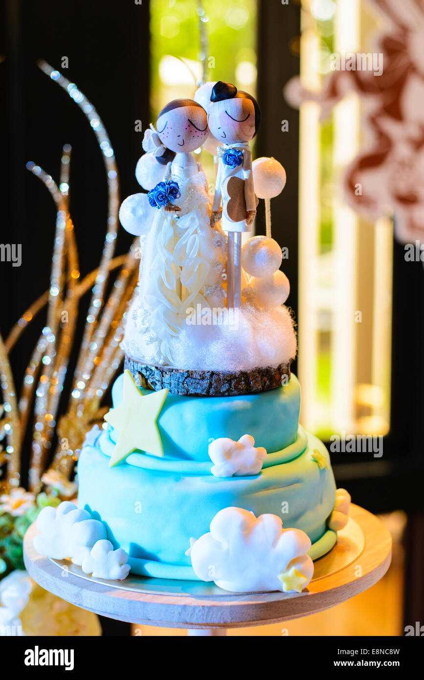 Wedding cake with wood doll Stock Photo