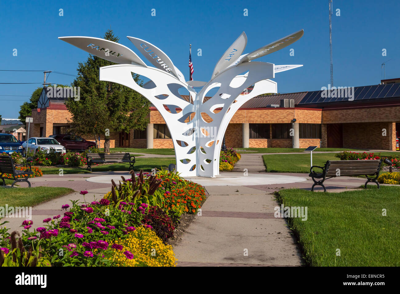 The city Hall and gardens with metal sculpture in Indianola, Iowa. Stock Photo