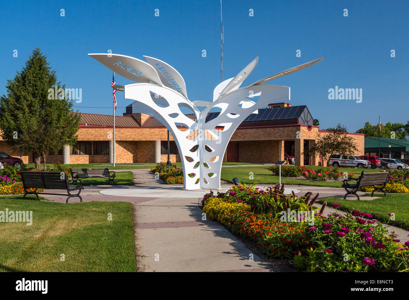 The city Hall and gardens with metal sculpture in Indianola, Iowa Stock