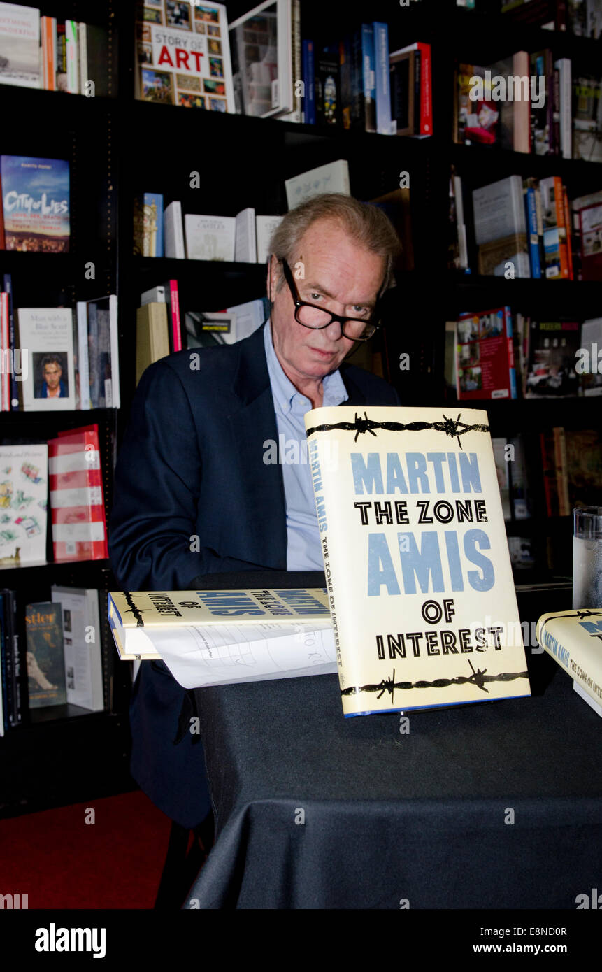 Martin Amis novelist, writer of Money, London Fields and Times Arrow signs his latest book The Zone of Interest  at the Cheltenham Literary Festival UK 2014 Credit:  Prixnews/Alamy Live News Stock Photo