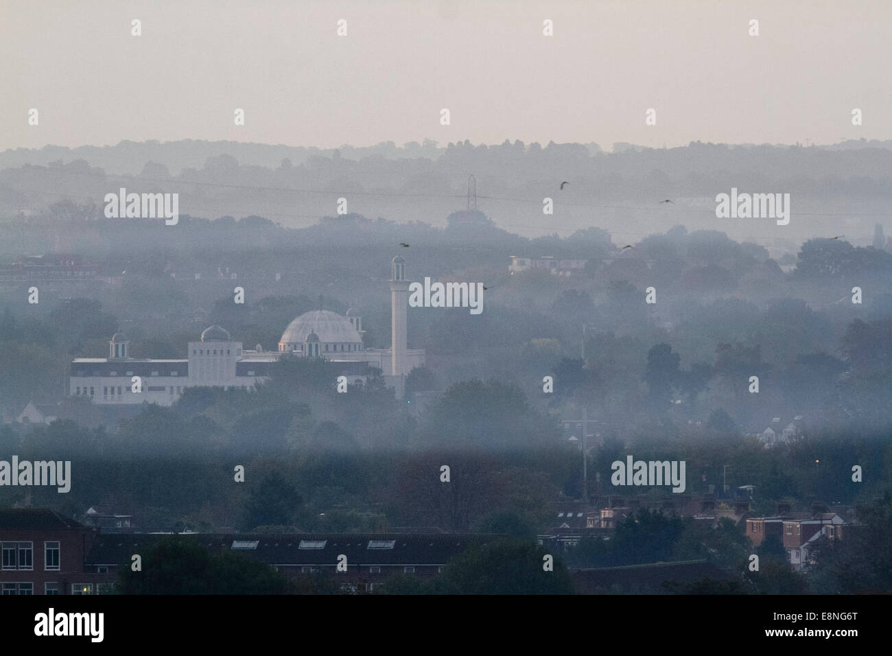 Wimbledon, London, UK. 12th October, 2014. UK weather. The Baitul Futuh