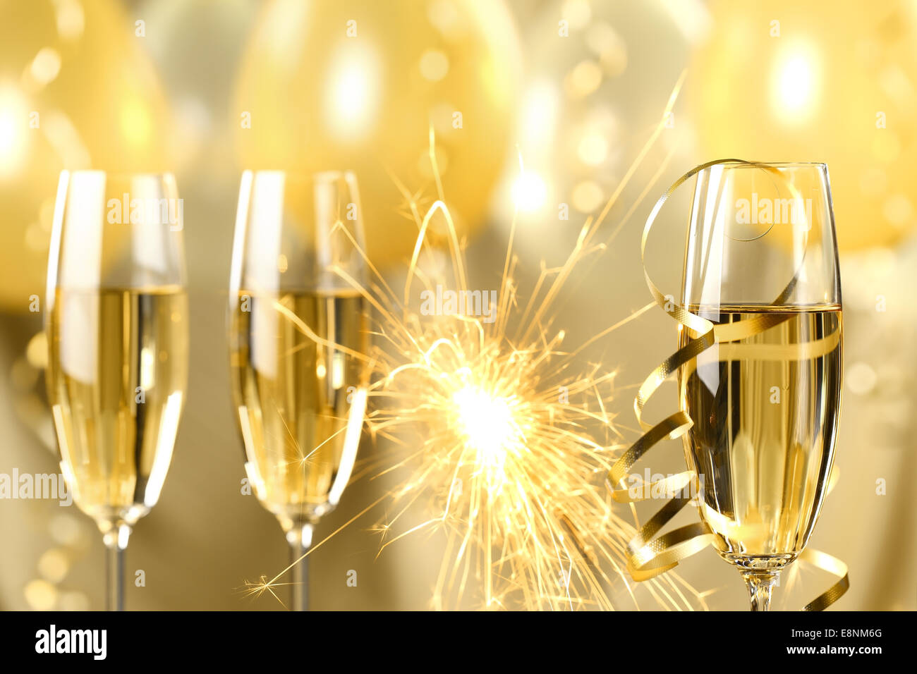 Glasses of champagne and fireworks,new year celebration. Stock Photo