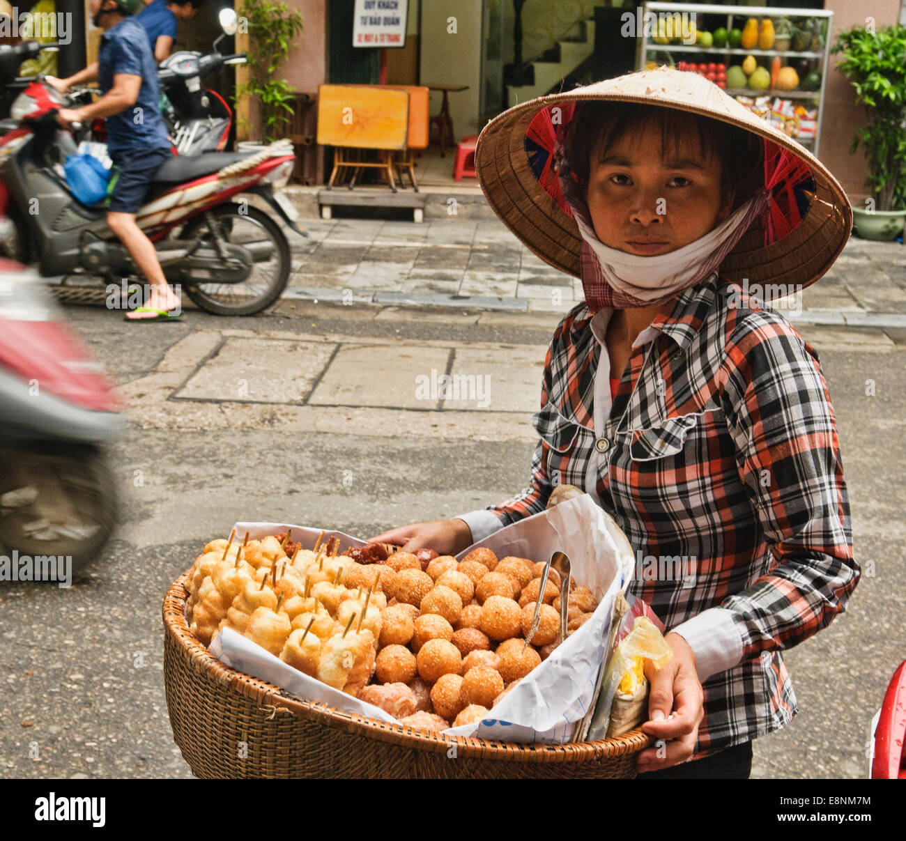 Bread and sweets Vietnamese street vendor in Hanoi, Vietnam Stock Photo