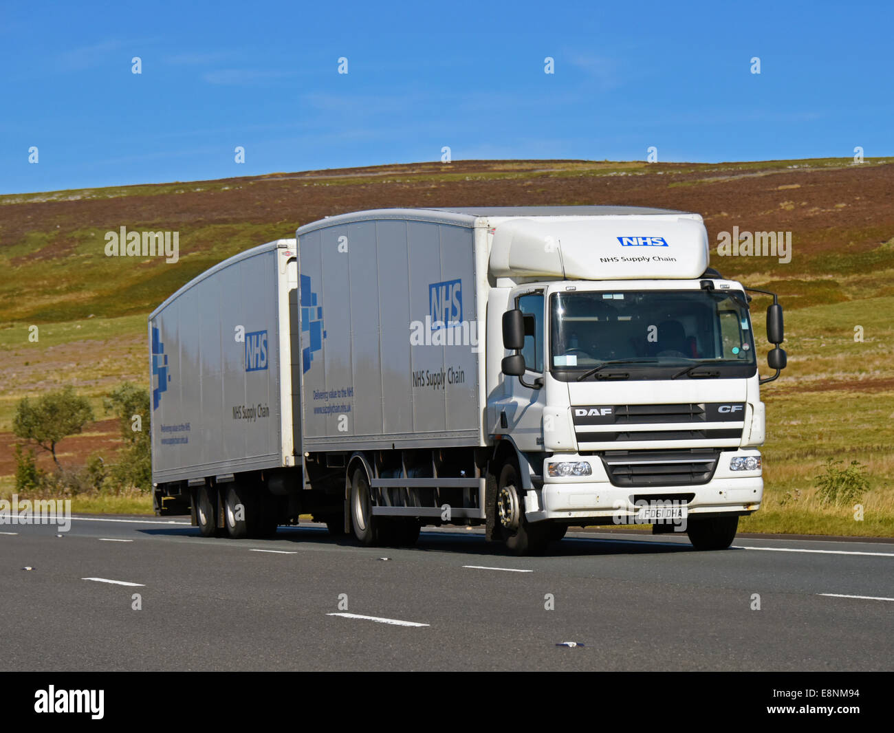 NHS Supply Train truck and trailer. M6 Motorway, southbound. Shap, Cumbria, England, United Kingdom, Europe. Stock Photo