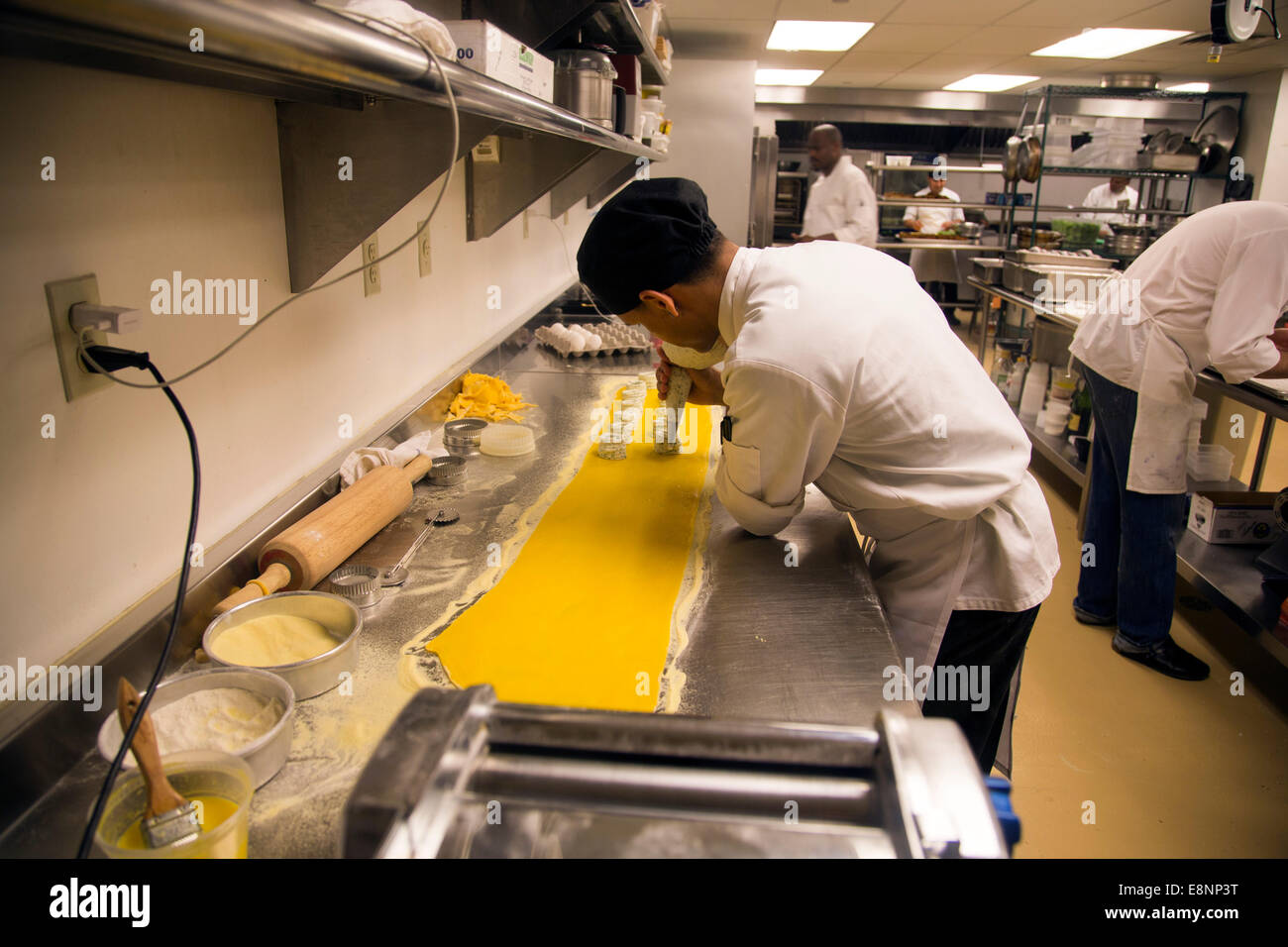Chef working New York high end restaurant kitchen Stock Photo