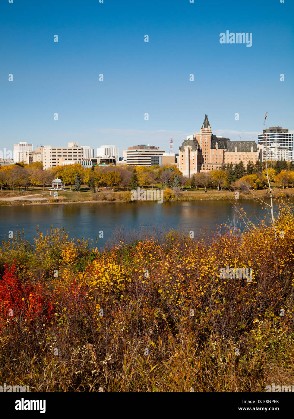 A view of downtown Saskatoon, the Delta Bessborough Hotel and South Saskatchewan River in fall (autumn).  Saskatoon, Canada. Stock Photo