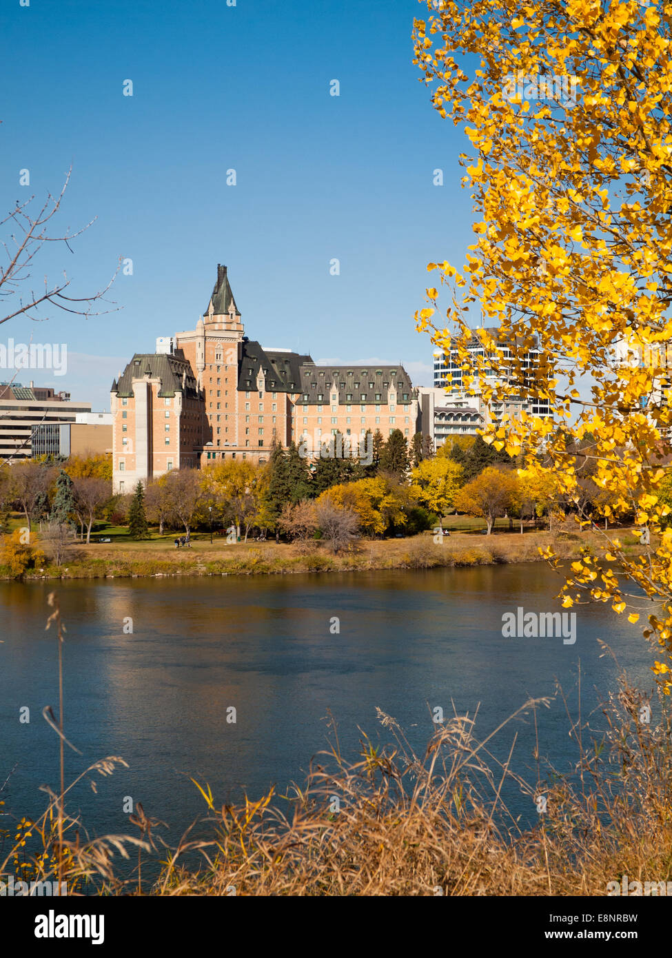 A view of downtown Saskatoon, the Delta Bessborough Hotel and South Saskatchewan River in fall (autumn).  Saskatoon, Canada. Stock Photo