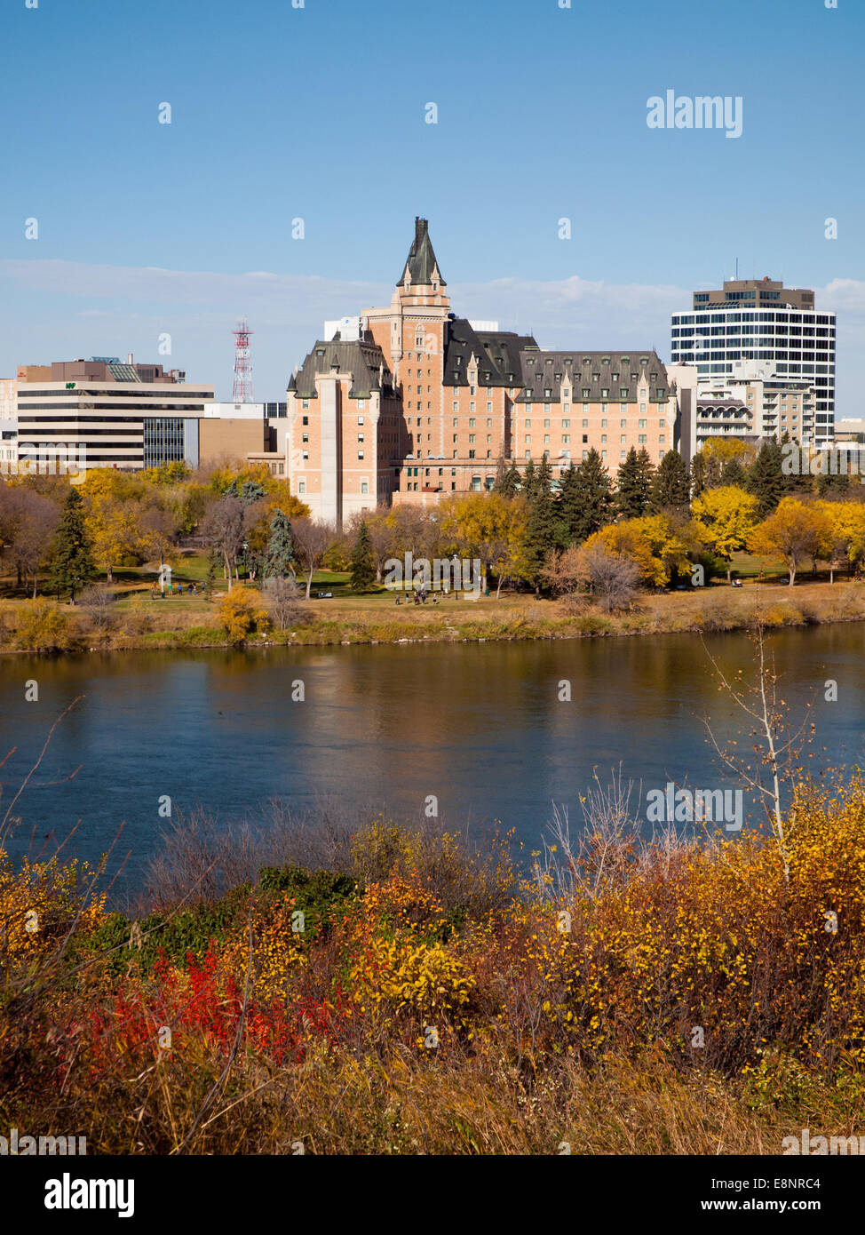 A view of downtown Saskatoon, the Delta Bessborough Hotel and South Saskatchewan River in fall (autumn).  Saskatoon, Canada. Stock Photo