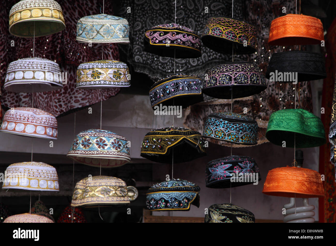 Hats on sale on Dargah Bazar, the main road leading to the shrine of Sufi saint Khwaja Muinuddin Chishti, in Ajmer, India Stock Photo