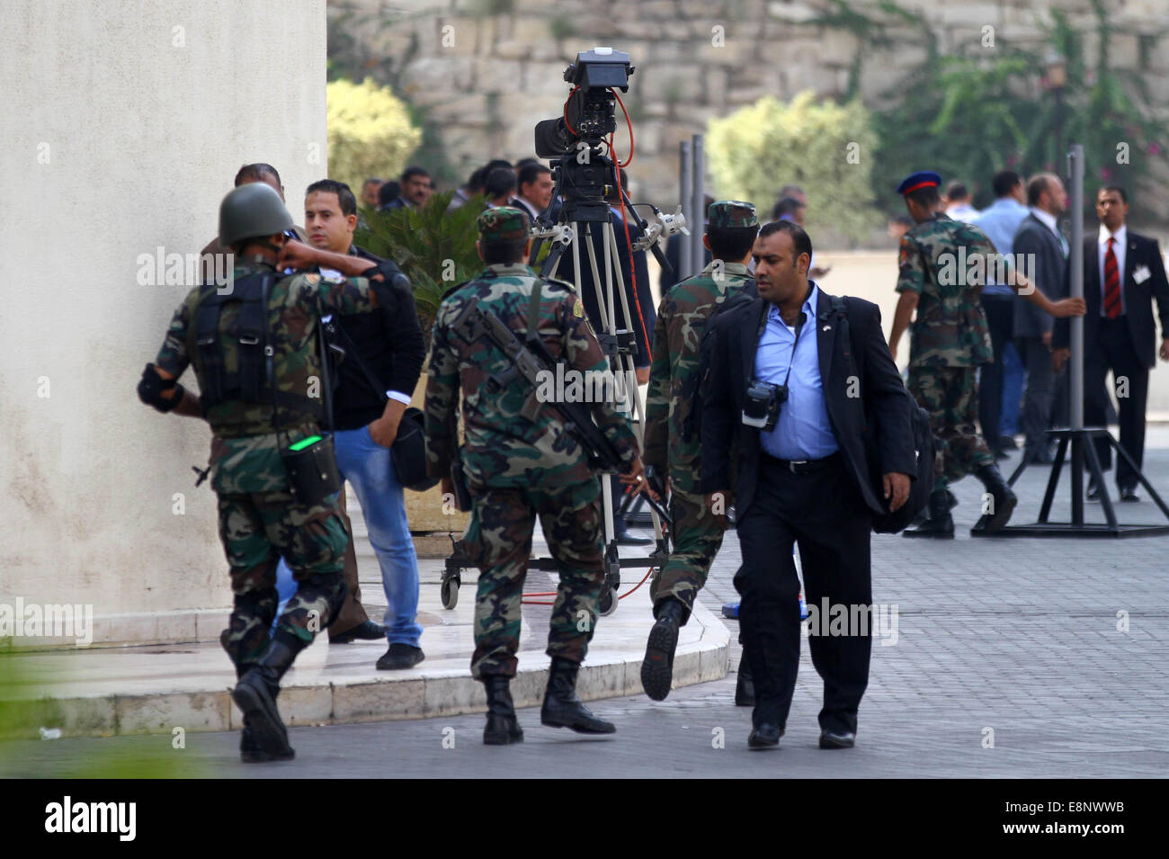 Cairo, Egypt. 12th Oct, 2014. Egyptian security forces stand guard as