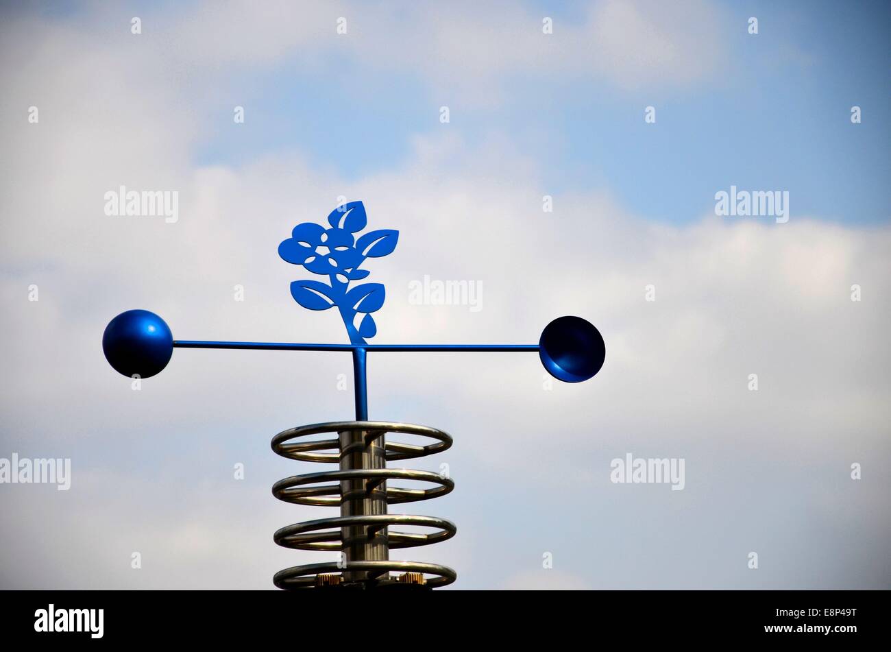 Wind instrument wind or weather vane or weathercock with floral design