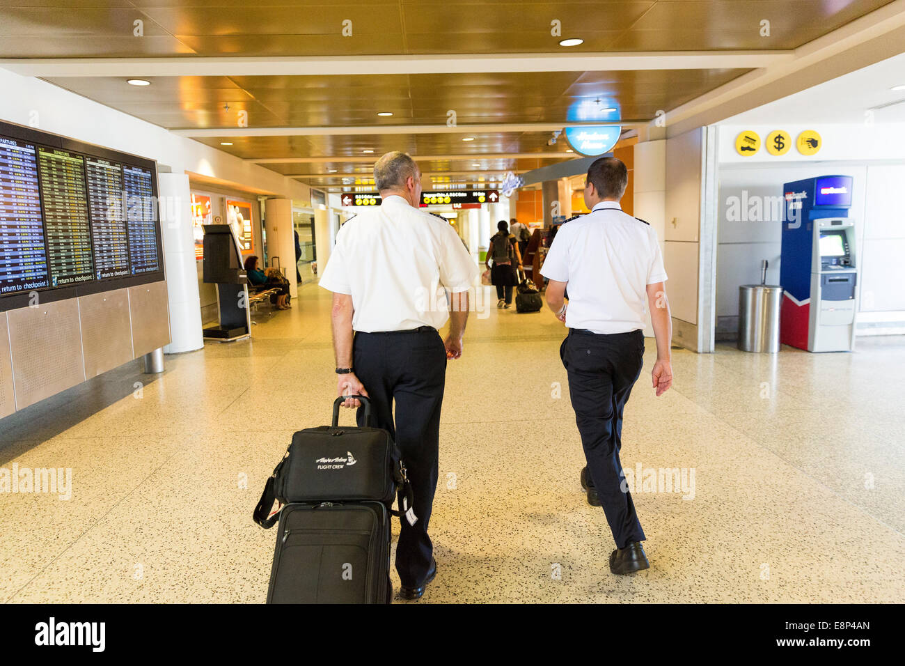 Pilots walking at the airport Stock Photo Alamy
