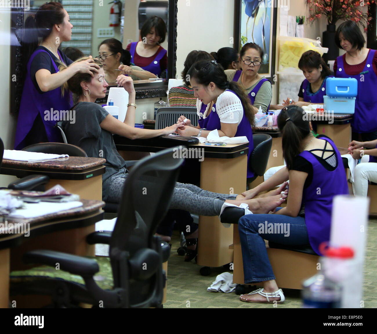 Rhea Durham at a nail salon in Beverly Hills having a manicure
