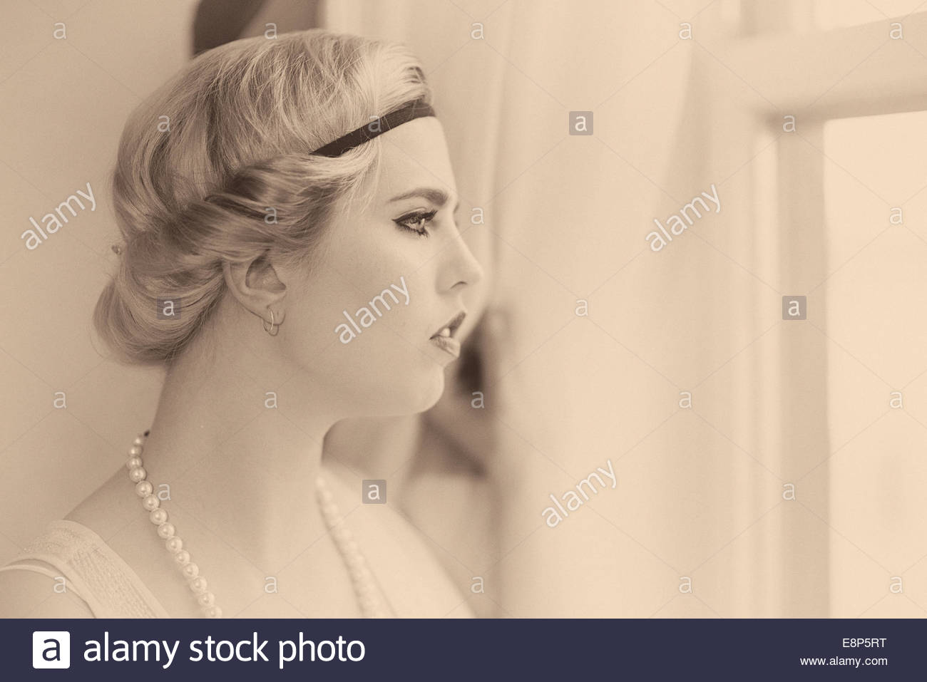 Profile Of A Woman In A Flapper Hair Style In Profile Done In
