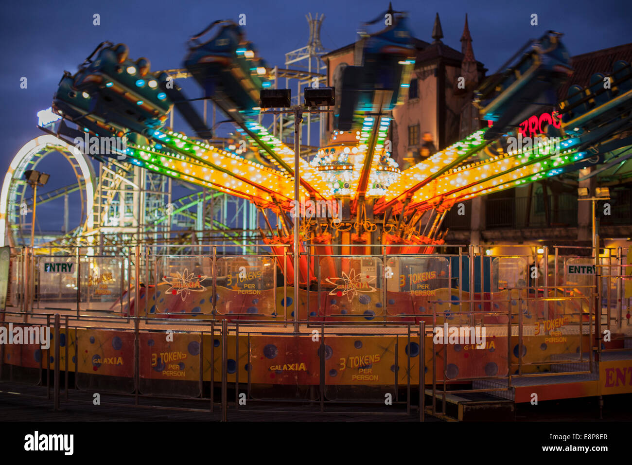 Brighton Fairground at night Octopus ride Stock Photo