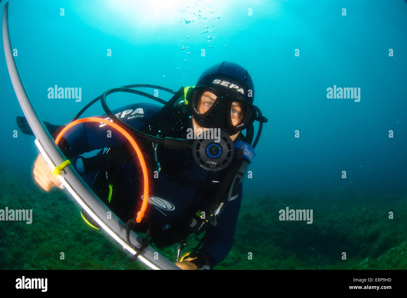 professional Scuba divers perform an underwater survey of the Mediterranean seabed Stock Photo