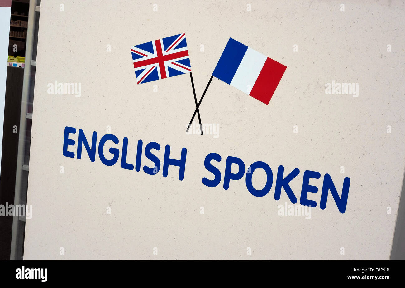 english spoken sign outside french shop Stock Photo