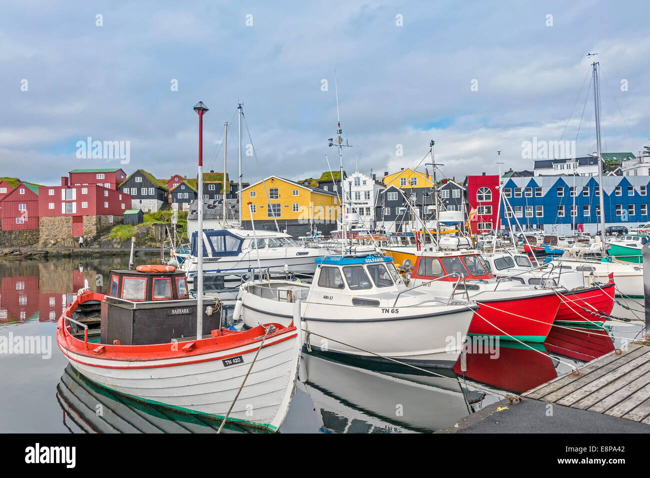 Fishing boats in small harbour hi-res stock photography and images - Alamy