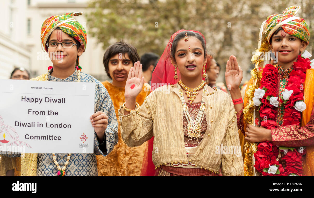 London, UK, 12 October 2014.  Children dressed as Lord Rama, his wife Sita and brother Lakshmana took part in the Children's parade to kick off the  annual Diwali Festival in Trafalgar Square.    Credit:  Stephen Chung/Alamy Live News Stock Photo