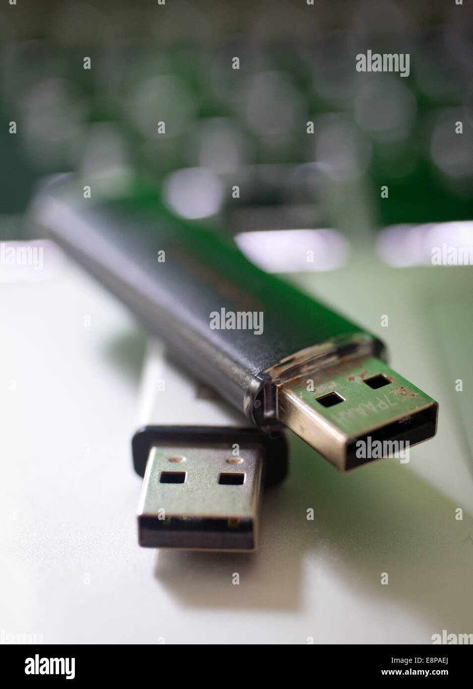 USB flash drives sitting on a MacBook Pro in October 2014 Stock Photo Alamy