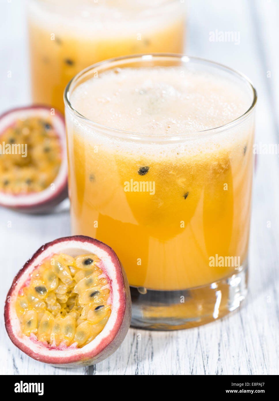 Glass With Maracuja Juice And Fresh Fruits On Wooden Background Stock Photo Alamy