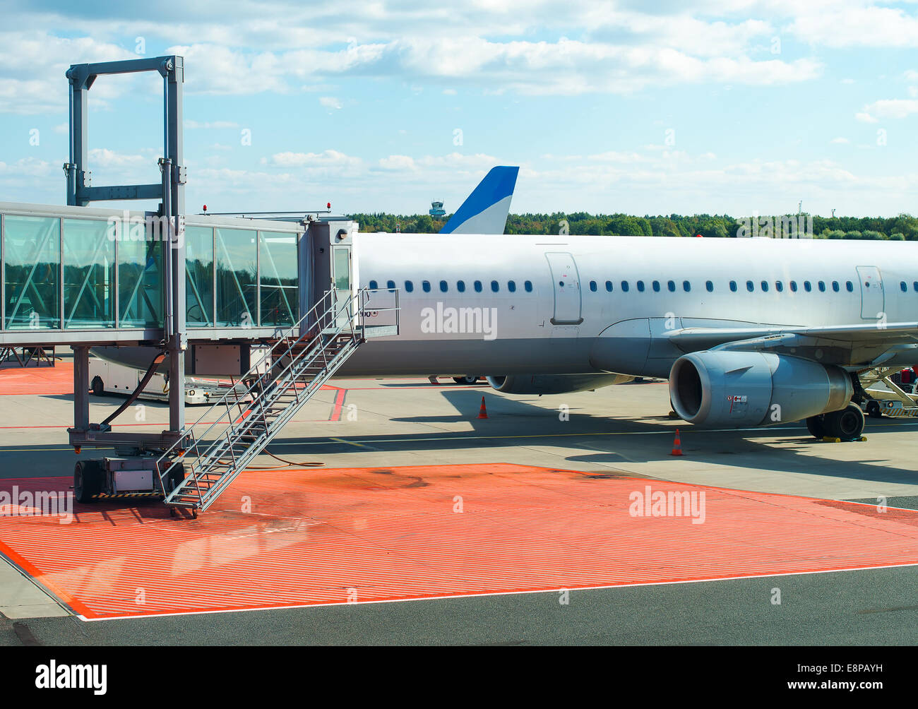 Jet bridge from an airport terminal gate Stock Photo - Alamy