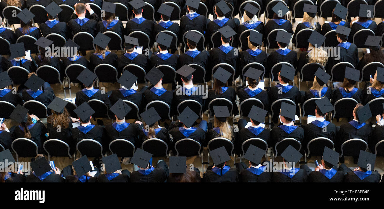 During the farewell ceremony of the Hamburg School of Business Administration, students sit in the audience, captured on 1 October 2014 in Hamburg. Stock Photo