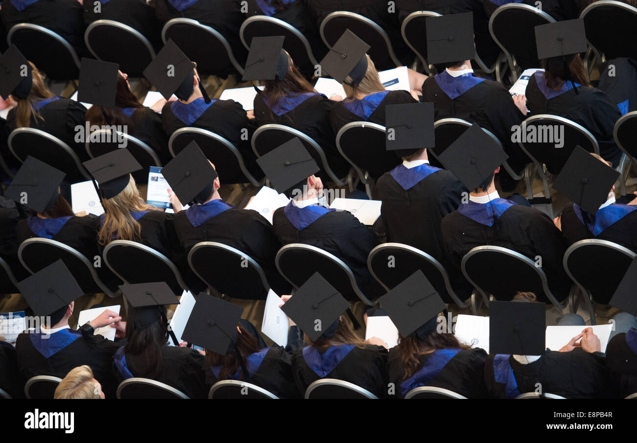 During the farewell ceremony of the Hamburg School of Business Administration, students sit in the audience, captured on 1 October 2014 in Hamburg. Stock Photo