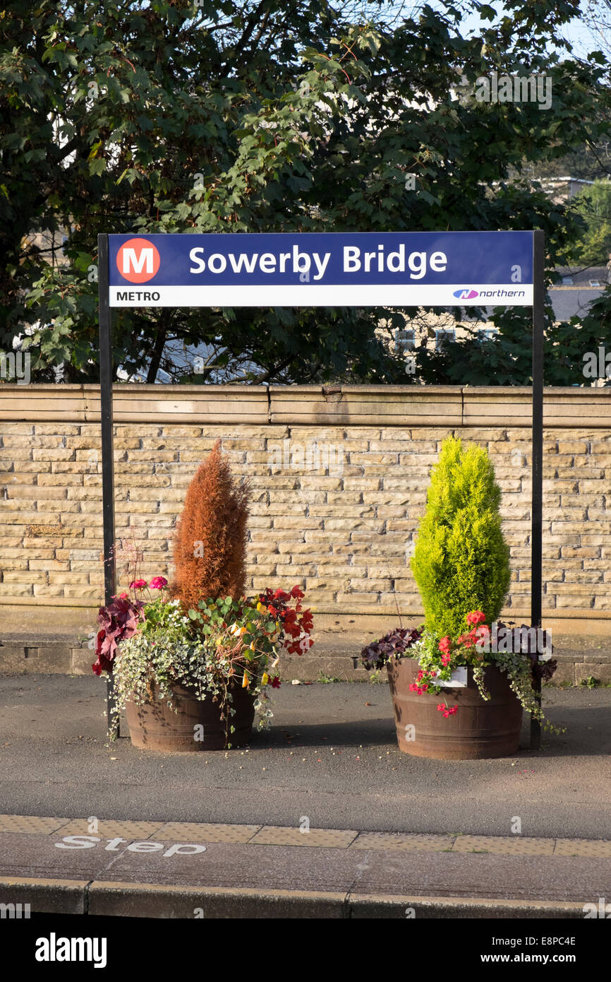 Flowers on the station platform, Sowerby Bridge, West Yorkshire Stock