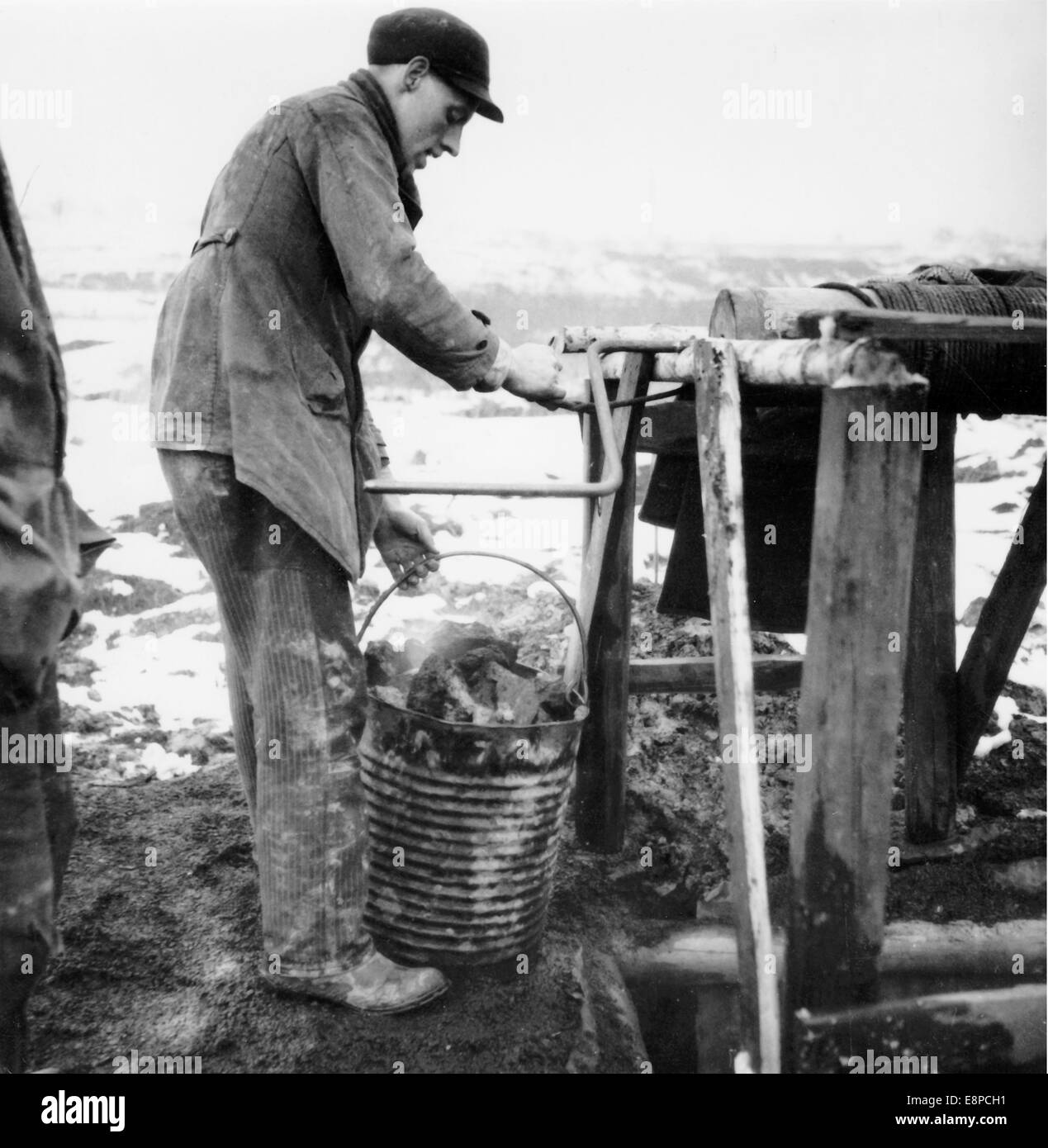 The picture from the Nazi news service shows Sudeten Germans savagely digging for coal in 1938 (?). he picture was used by the Nazis to shows the bad living conditions of the Sudeten Germans in Czechoslovakia. Fotoarchiv für ZeitgeschichteNO WIRE SERVICE Stock Photo