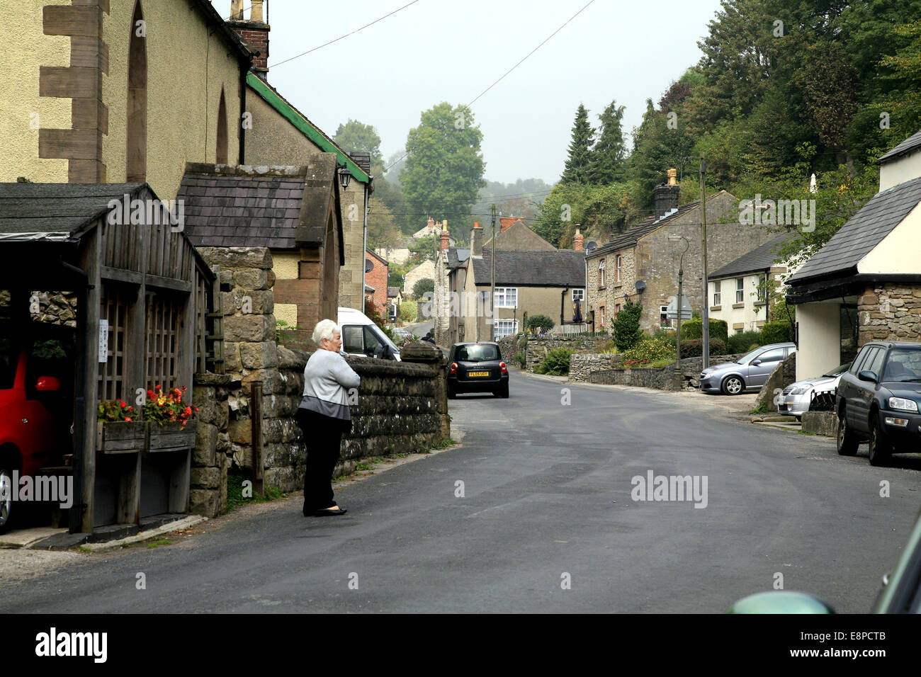 The main road through the village of Bonsall, Derbyshire, England, UK. Stock Photo