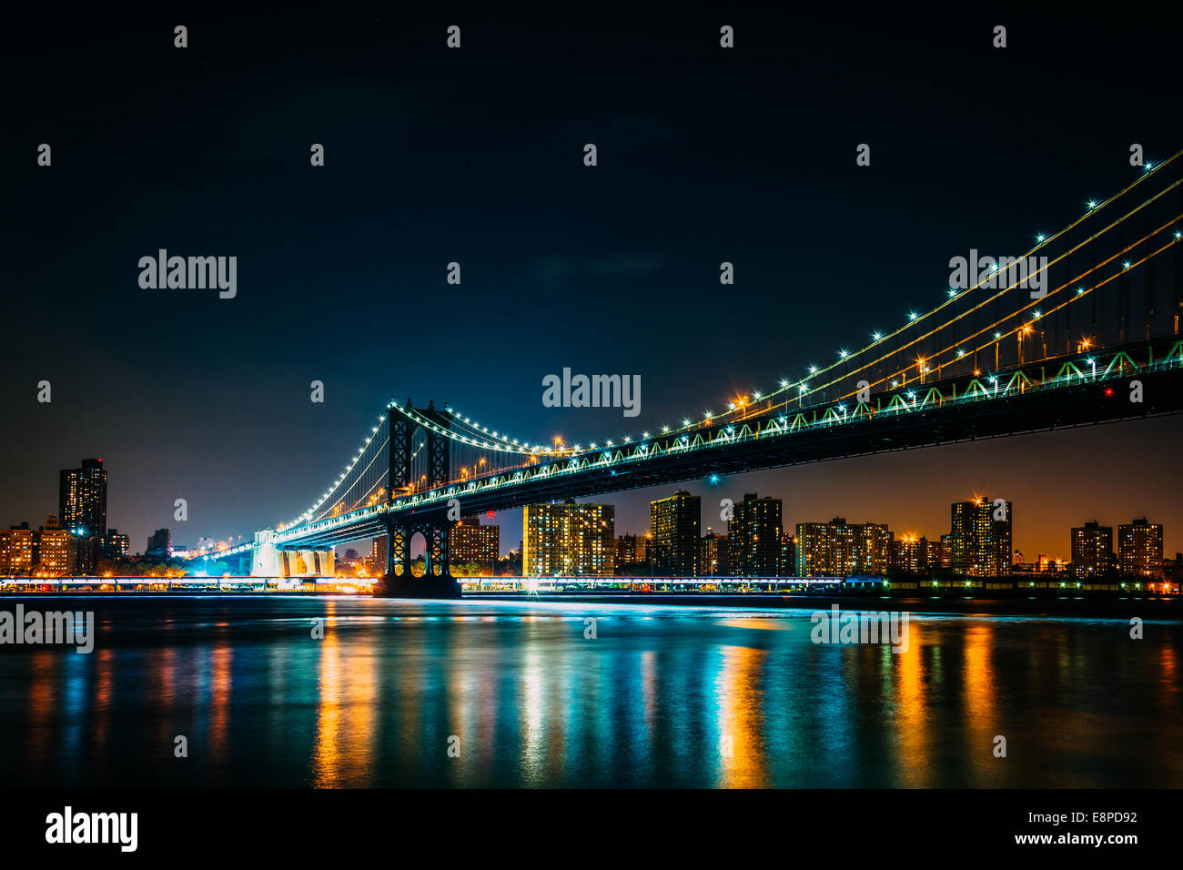 Manhattan Bridge at night, seen from Brooklyn Bridge Park, in Brooklyn