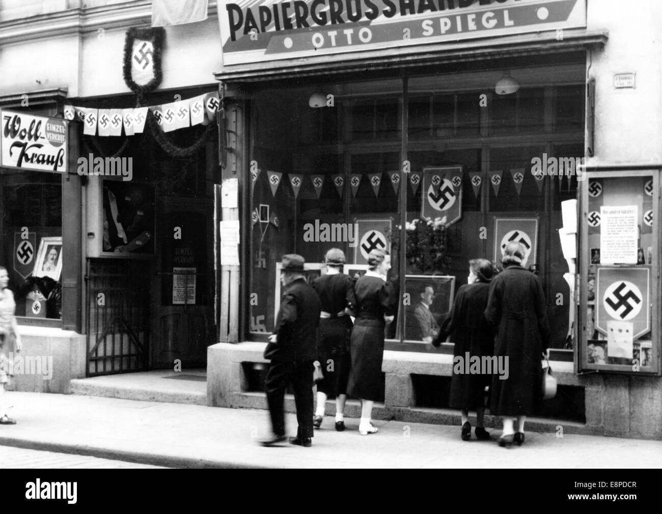 The Nazi propaganda picture shows the festively decorated city after occupation by the German army in Asch, Sudetenland (today Czech Republic) 1938. The original text from a Nazi news report on the back of the picture reads 'Sudetenland after the withdrawal of Czech forces. The liberated city of Asch is decorated festively. Swastikas are flying in the streets and infinite pictures of the Fuhrer are on display in shop windows.' Fotoarchiv für Zeitgeschichtee - NO WIRE SERVICE Stock Photo