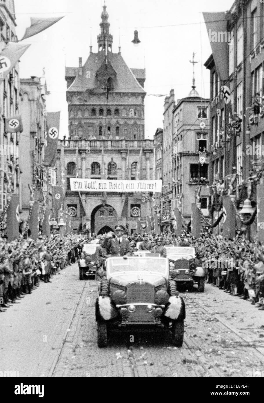 The Nazi propaganda picture shows Adolf Hitler arriving in the