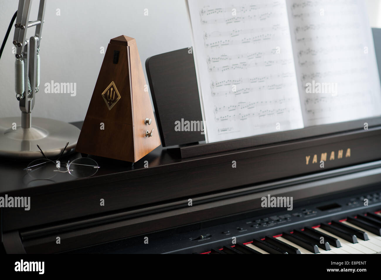 Metronome and Piano Stock Photo - Alamy