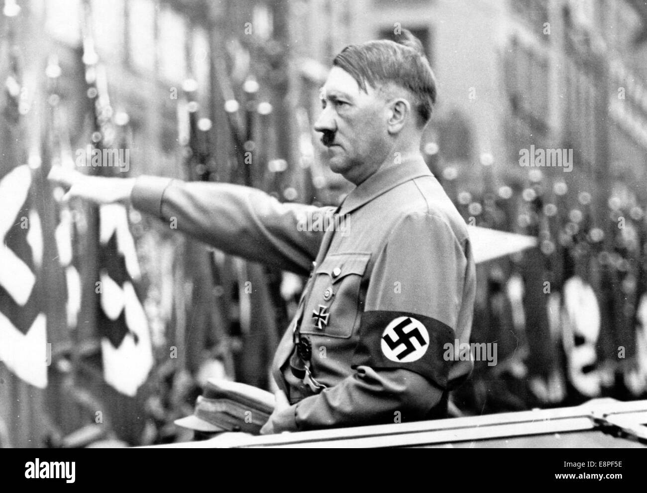 The Nazi Propaganda! image shows Adolf Hitler greeting members of the SA, SS, NSKK, and NSFK who march past him on the Nurmberg Rally in Nuremberg, Germany, 6-13 September 1937. Fotoarchiv für Zeitgeschichte Stock Photo