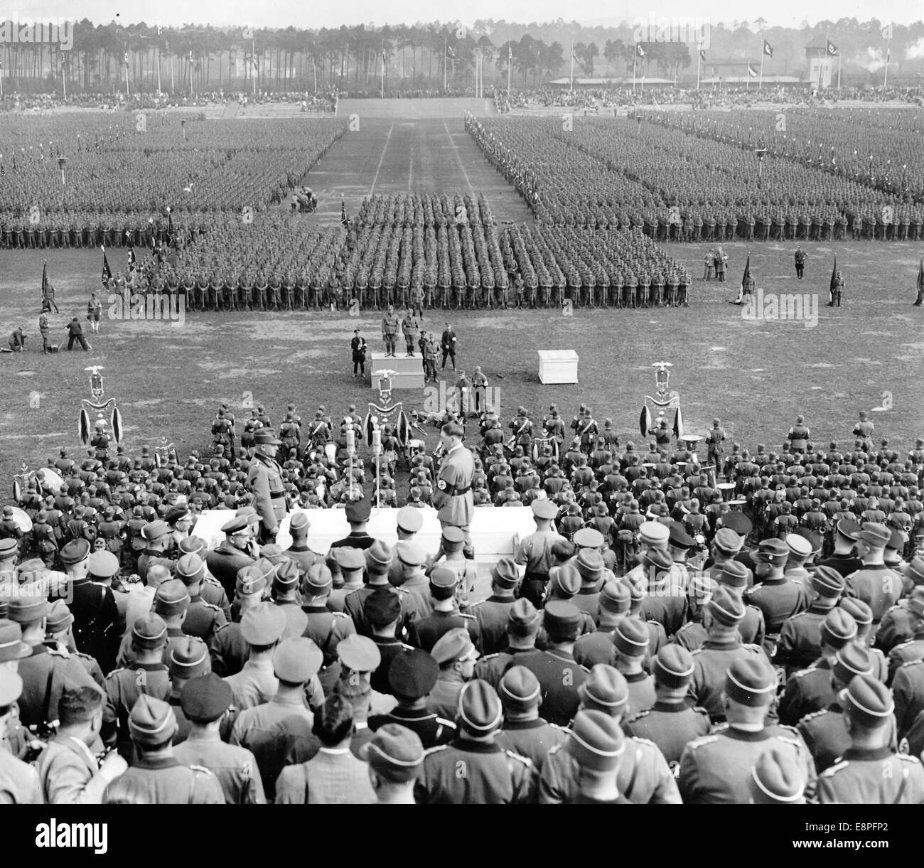 Nuremberg Rally 1934 in Nuremberg, Germany - Head of the Reich Labour Service (RAD) Konstantin Hierl reports the assembly for a roll call of 52,000 members of the RAD to Adolf Hitler on Zeppelin Field at the Nazi party rally grounds. (Flaws in quality due to the historic picture copy) Fotoarchiv für Zeitgeschichtee - NO WIRE SERVICE - Stock Photo