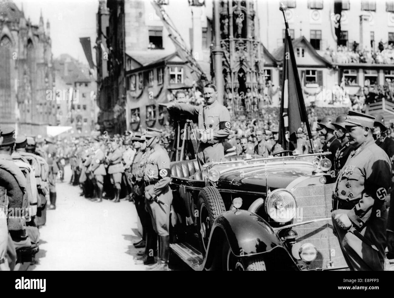 Nuremberg Rally 1934 in Nuremberg, Germany - Adolf Hitler greets an SA (Sturmabteilung) parade with the Nazi salute. On the right: Hermann Goering. (Flaws in quality due to the historic picture copy) Fotoarchiv für Zeitgeschichtee - NO WIRE SERVICE - Stock Photo